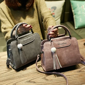 Безплатна доставка, 2017 нови дамски чанти, лесен модерен клапа, тенденция пискюл дамска чанта-месинджър, корейската версия на чанти за рамо.